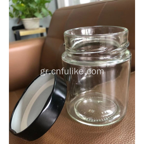 κεχριμπαρένιο γυάλινο στρογγυλό βάζο με ίσια όψη με μαύρο μεταλλικό καπάκι 200ml